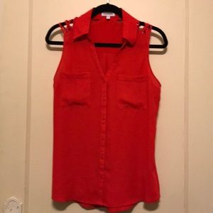 Bright red sleeveless top